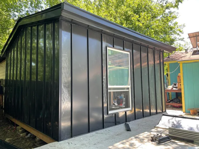 Black standing seam metal wall panels for Roof Inspection in Windham